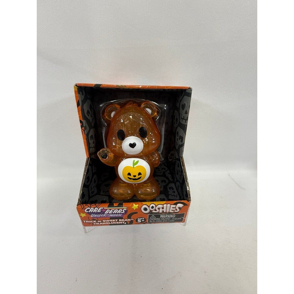 Care Bears Ooshies Trick or Sweet Bear translucent orange vinyl figure NIB